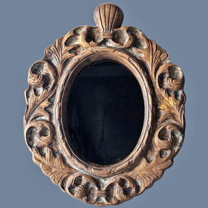 1960s jaru of california ceramic baroque mirror with dark tint 6354