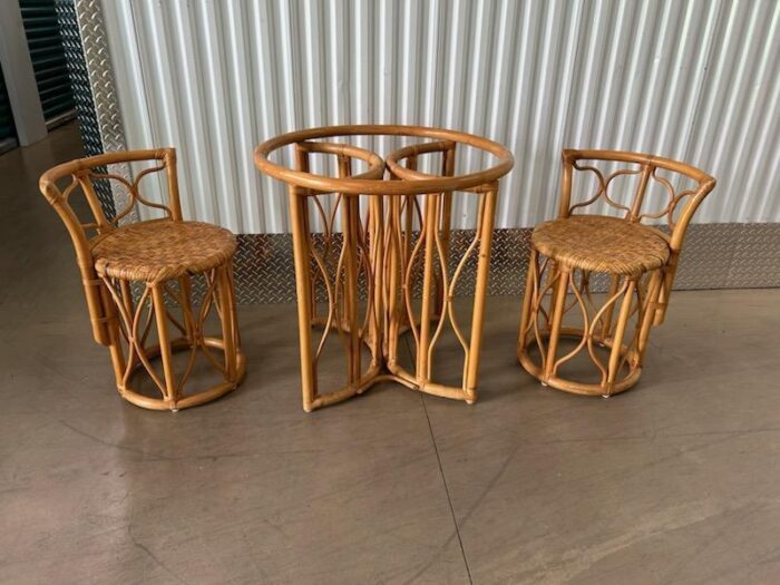 1970s vintage rattan honeymoon bistro set woven seats and glass top set of 3 6474