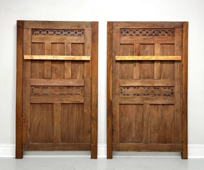 20th century carved balinese mahogany doors converted to headboards pair 7220