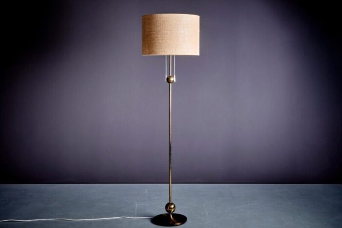 brass floor lamp with round brass base 1960s 2