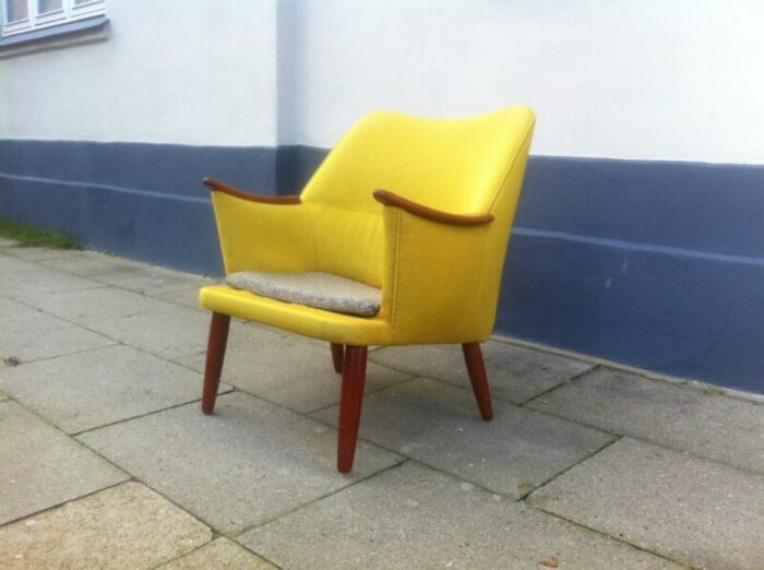 danish mid century modern easy chair in yellow wool with teak accents 1950s 1