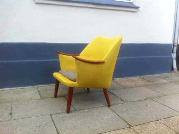 danish mid century modern easy chair in yellow wool with teak accents 1950s 2