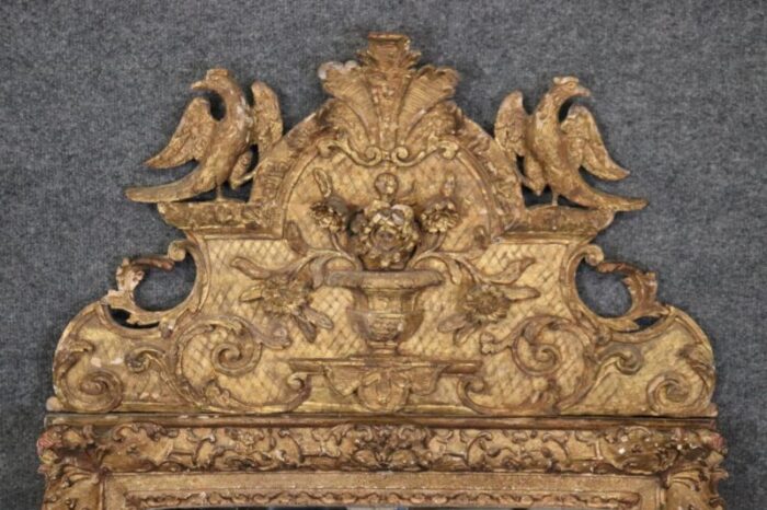 early 18th century period french louis xiv giltwood mirror with birds 8946