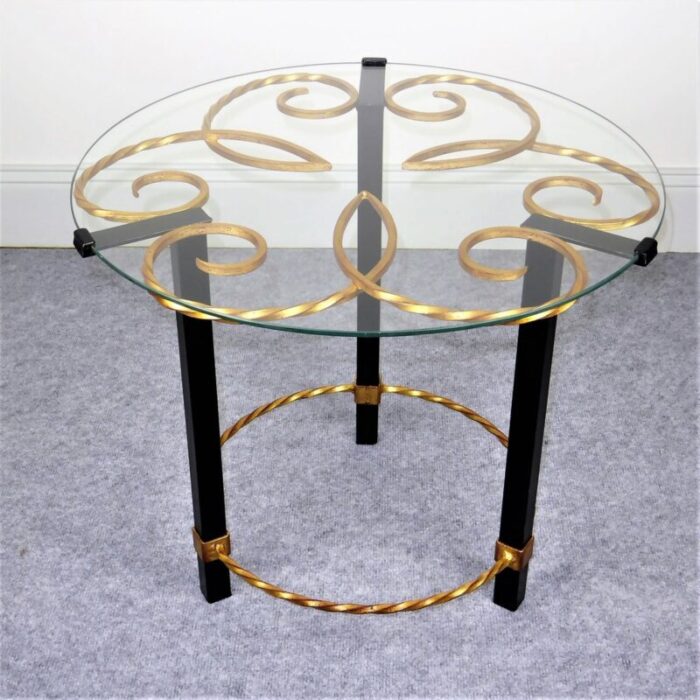 gilded black lacquered metal gueridon with glass top 1950s 2