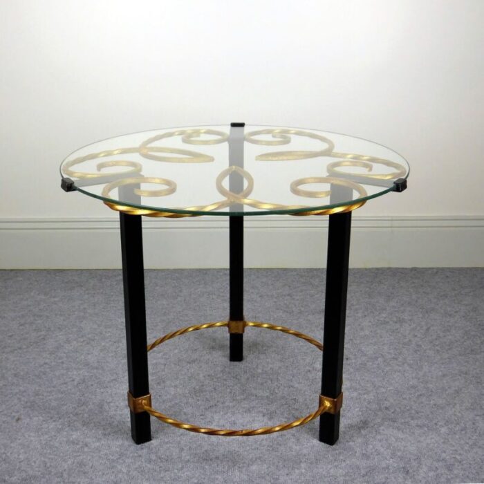 gilded black lacquered metal gueridon with glass top 1950s 3