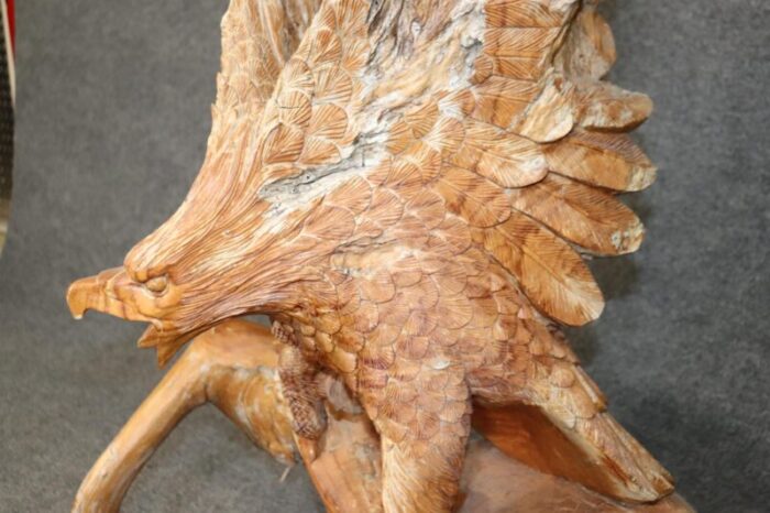 hand carved walnut american sculpture of a bald eagle landing on tree 9812