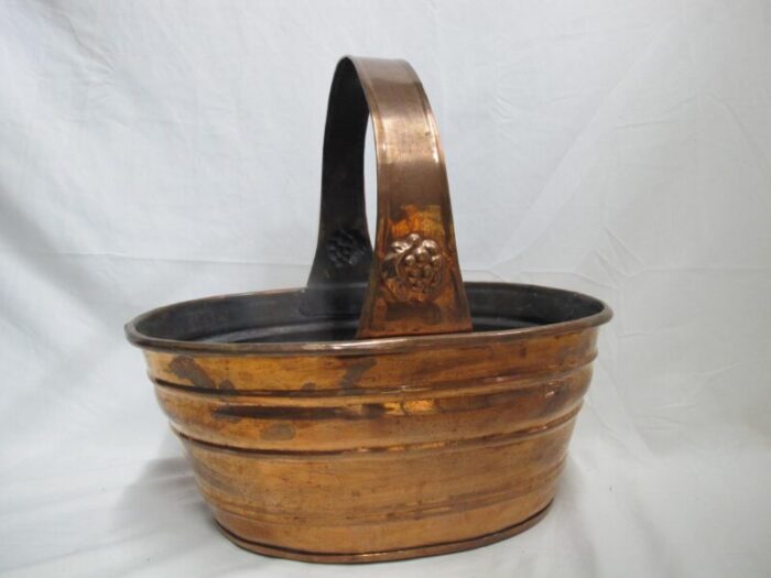 large vintage copper rustic basket with grape bunch design at handle 3105