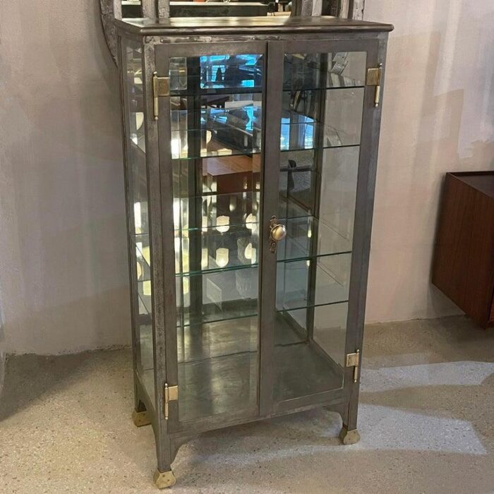 late 19th century antique industrial brushed steel double door apothecary display cabinet 7495