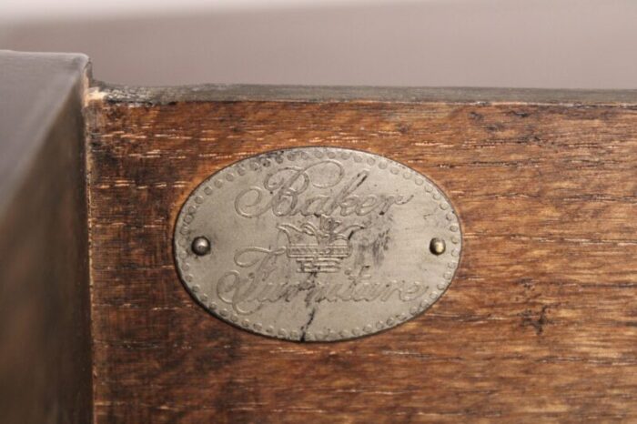 louis xv style black lacquer desk with a tooled leather top made by baker 1302