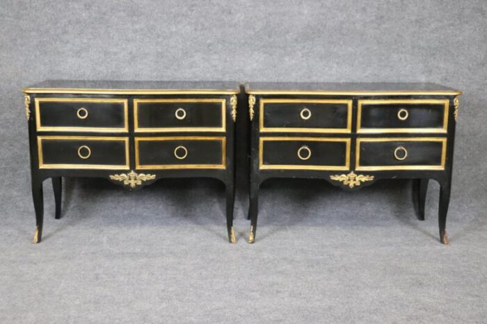 matched maison jansen style ebonized and gilded louis xv commodes a pair 0753