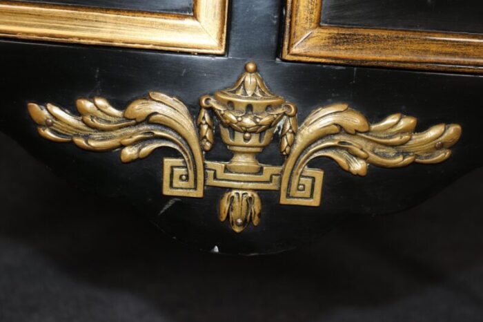 matched maison jansen style ebonized and gilded louis xv commodes a pair 4643