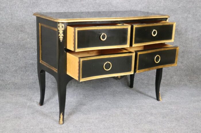 matched maison jansen style ebonized and gilded louis xv commodes a pair 9985