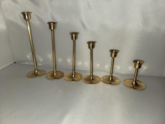 mid 20th century mid century graduated tulip based brass candlesticks set of 6 3864