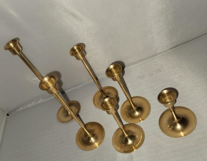 mid 20th century mid century graduated tulip based brass candlesticks set of 6 4847