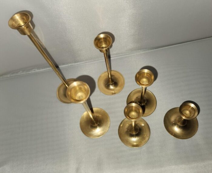 mid 20th century mid century graduated tulip based brass candlesticks set of 6 6991