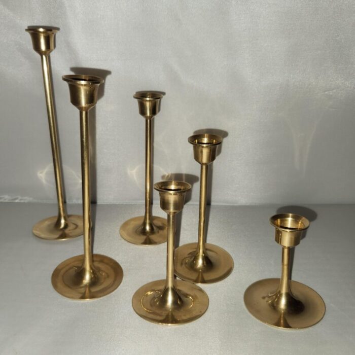 mid 20th century mid century graduated tulip based brass candlesticks set of 6 7629