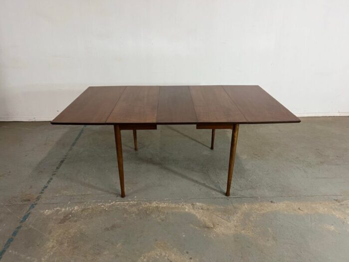 mid century modern walnut 60 drop leaf dining table by h p browning 4216