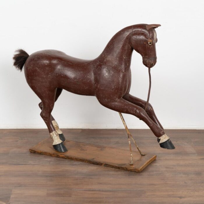 original brown painted and carved wooden horse from sweden circa 1900 9333