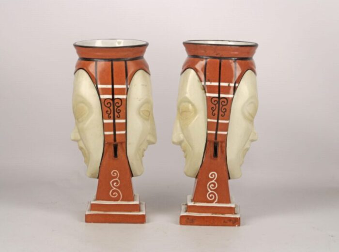 pair of antique french vases made of hand painted unglazed porcelain representing two facesmasks signed by aladin 5915