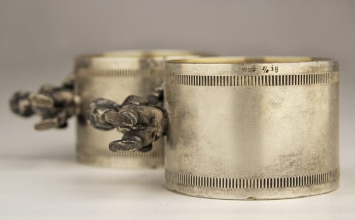 pair of early 20th century jugendstilart nouveau silver napkin rings and decorative box by german company wurttembergische metallwarenfabrik wmf 6090