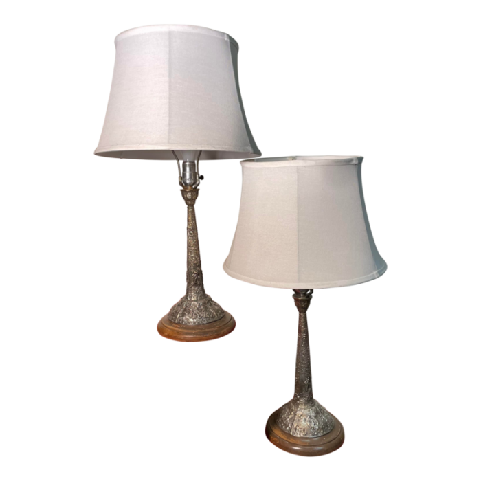 pair of hand hammered silver lamps 3138