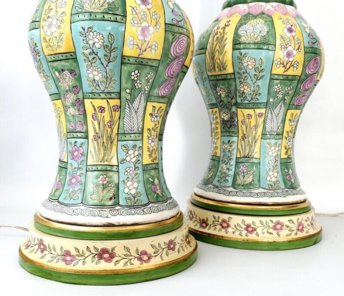 pair of vintage chinese porcelain ceramic table lamps baluster shaped with heavy famille rose glaze and hand painted wood bases restored 4779