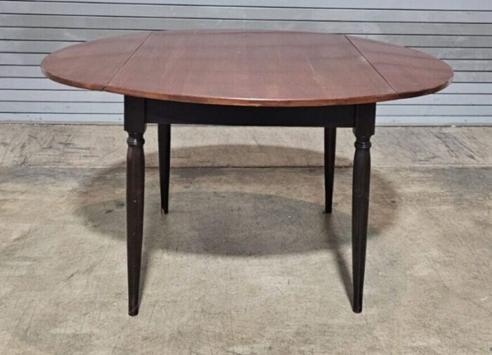 primitive cherry top drop leaf dining table over four black painted legs 5591