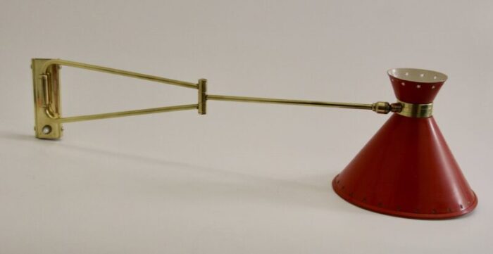 red diabolo articulated wall light by rene mathieu for lunel 1950s 4