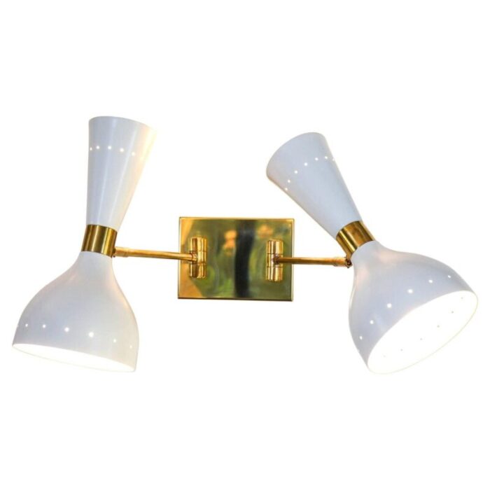 sconces with pivot heads by silvio piattelli 1