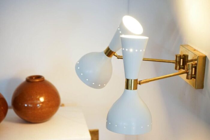 sconces with pivot heads by silvio piattelli 10