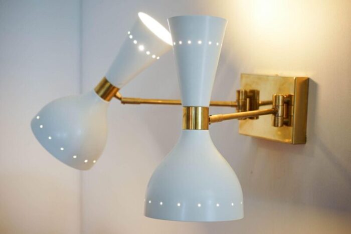 sconces with pivot heads by silvio piattelli 13