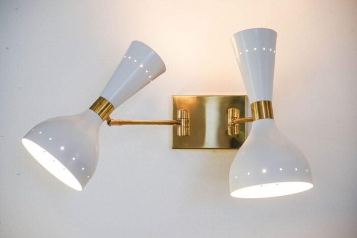 sconces with pivot heads by silvio piattelli 15