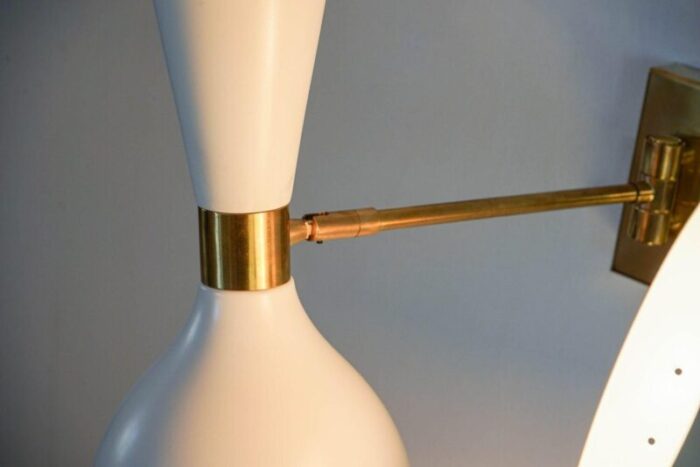 sconces with pivot heads by silvio piattelli 16