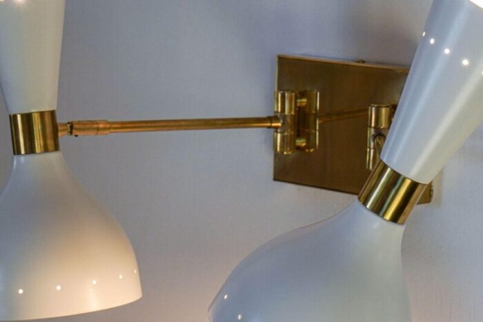 sconces with pivot heads by silvio piattelli 17