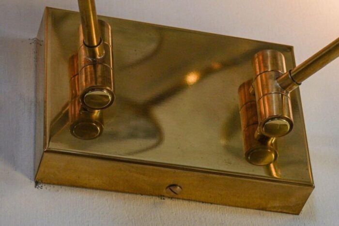 sconces with pivot heads by silvio piattelli 4