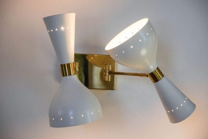 sconces with pivot heads by silvio piattelli 7