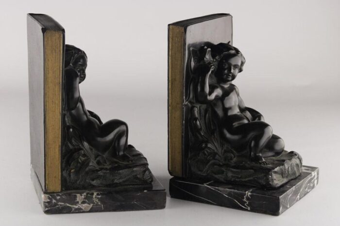 set of 2 early 20th century french art deco zamac winged cherubfairy child bookends with marble base 1994