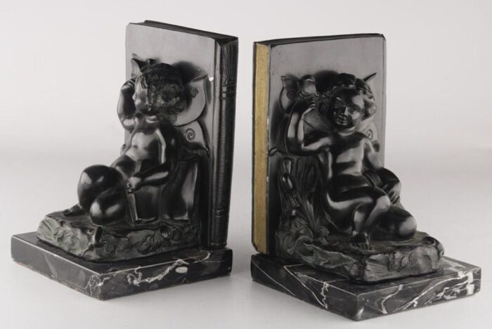 set of 2 early 20th century french art deco zamac winged cherubfairy child bookends with marble base 4483