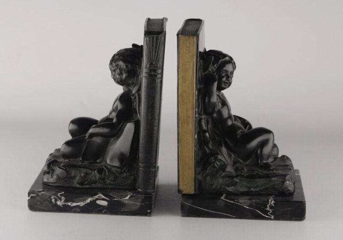 set of 2 early 20th century french art deco zamac winged cherubfairy child bookends with marble base 8899