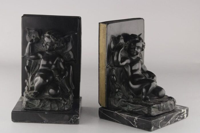 set of 2 early 20th century french art deco zamac winged cherubfairy child bookends with marble base 9424