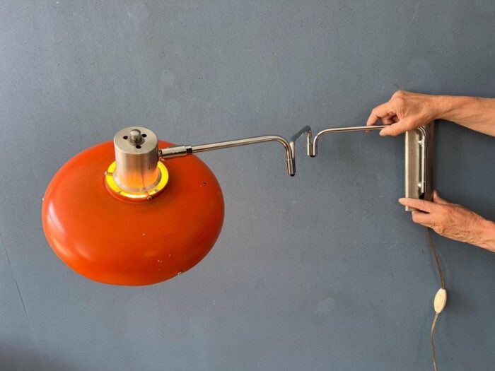 space age orange swivel arm wall lamp from lakro 1