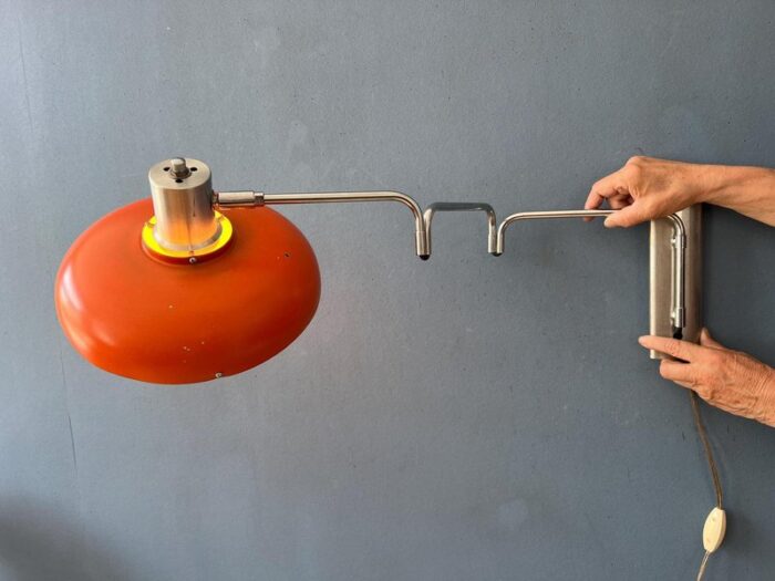 space age orange swivel arm wall lamp from lakro 3