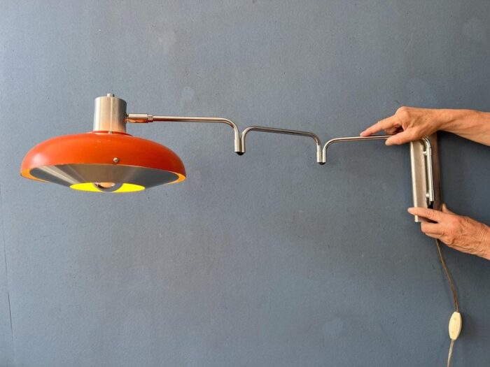 space age orange swivel arm wall lamp from lakro 4