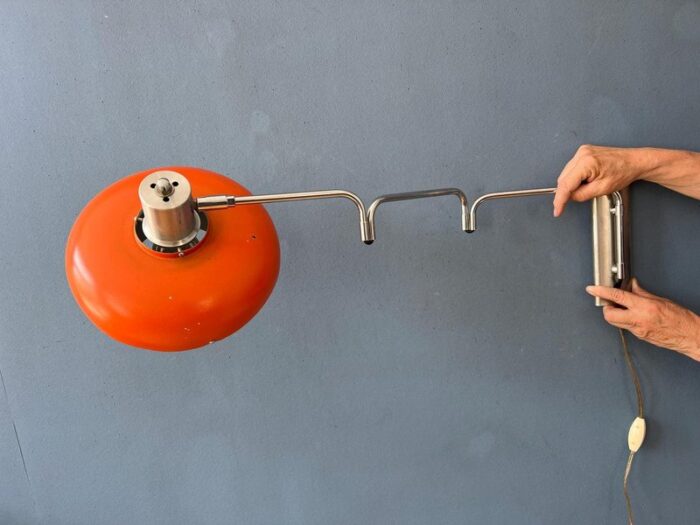 space age orange swivel arm wall lamp from lakro 6