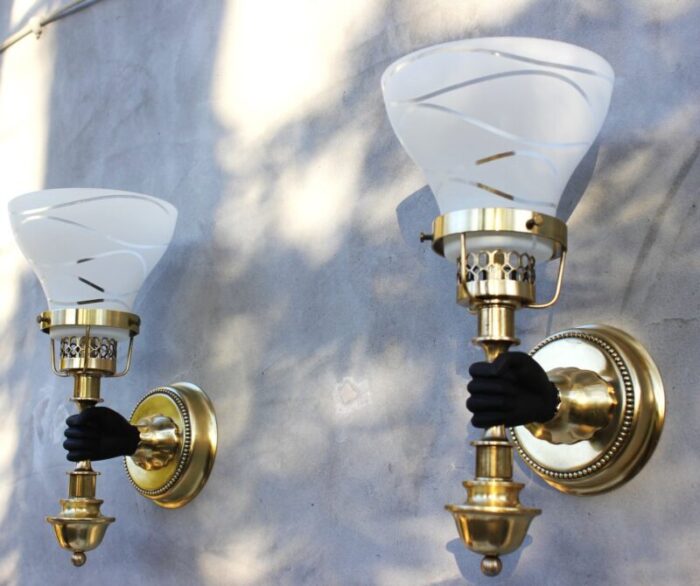 vintage neoclassical empire brass wall sconces with black hand torch by maison jansen set of 3 1