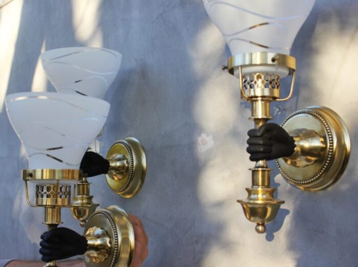 vintage neoclassical empire brass wall sconces with black hand torch by maison jansen set of 3 4