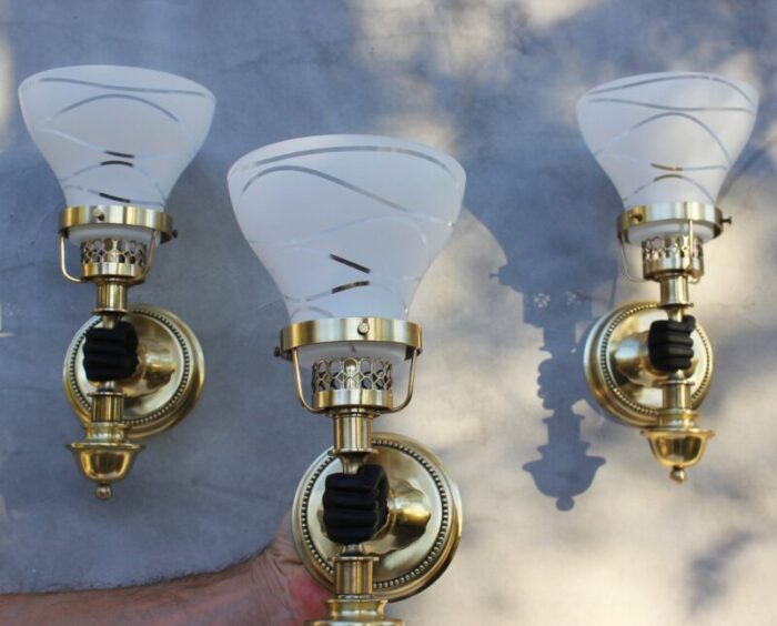 vintage neoclassical empire brass wall sconces with black hand torch by maison jansen set of 3 7