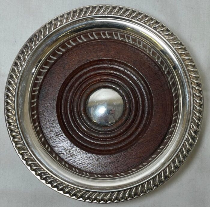 vintage ornate barker ellis silver plate and wood wine coaster made in england circa 1930 1956