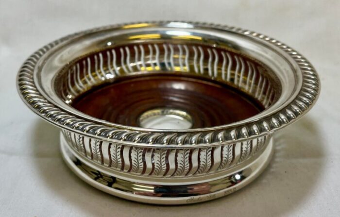 vintage ornate barker ellis silver plate and wood wine coaster made in england circa 1930 3562