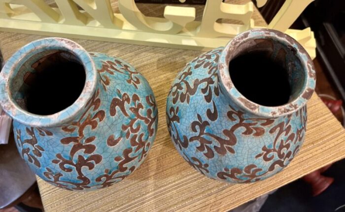 vintage pair of carved pottery with foliate design 7260